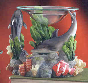 *  YOU  WANT  FANCY  ?  WELL  HERE  IS  A  SWIMMING   TWO  DOLPHINS  THAT  IS  REALY  A  GREAT LOOKING  FRAGRANCE  OIL  WARMER,  YOU  WILL  JUST  HAVE  TO  HAVE  !!!!
